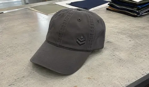 Custom embroidered baseball cap manufactured by Anthea for brand merchandise and corporate use